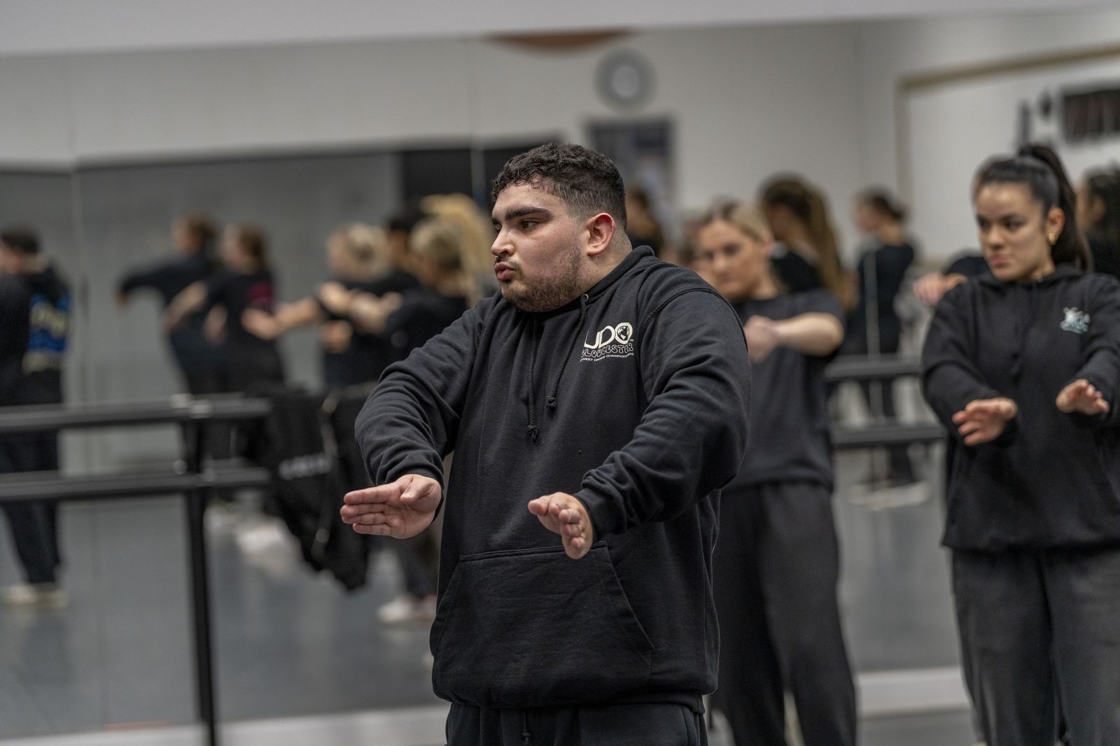 Continuity choreographer leading a competition rehearsal