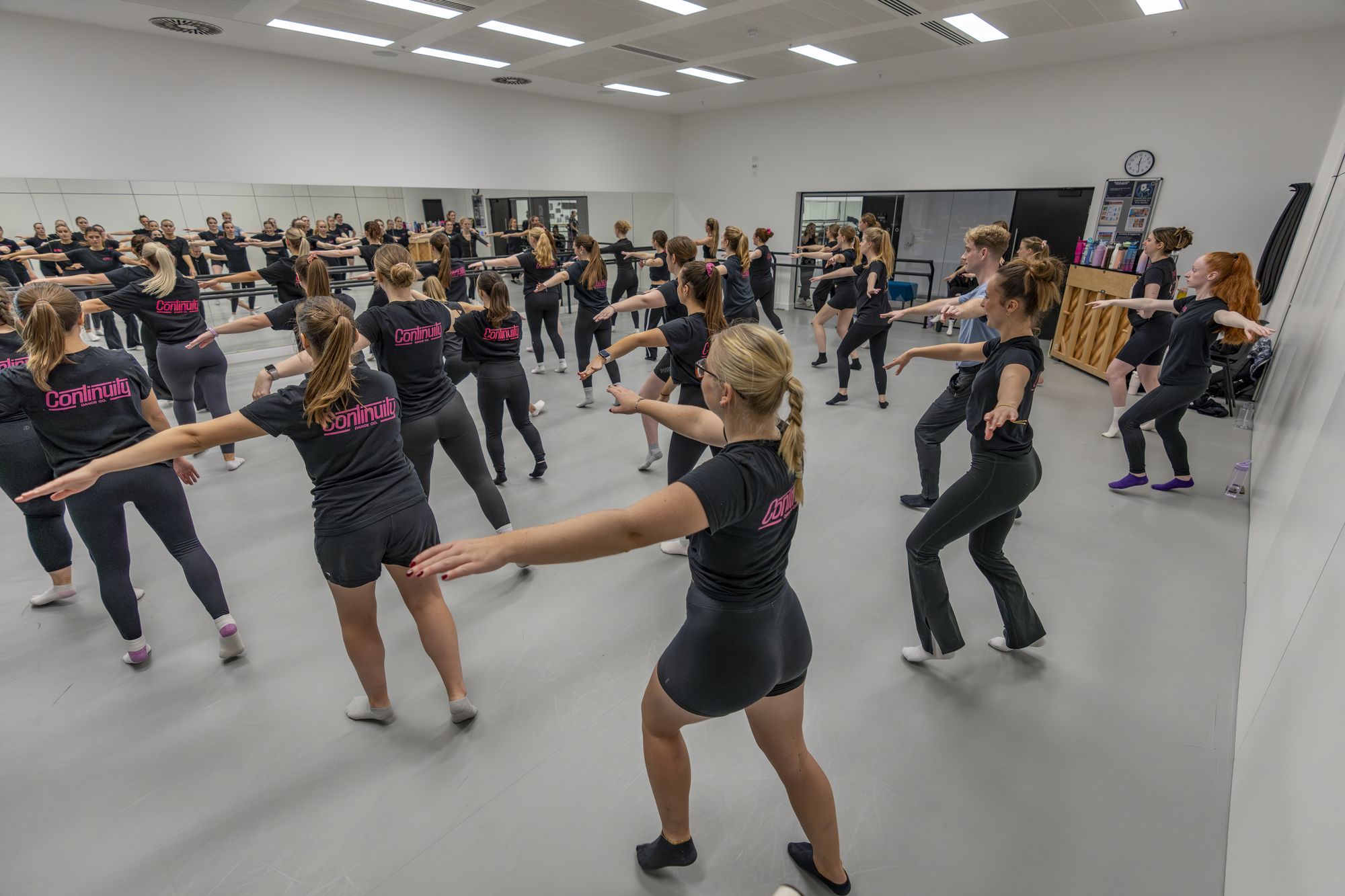 Continuity dancers in Continuity t-shirts, rehearsing